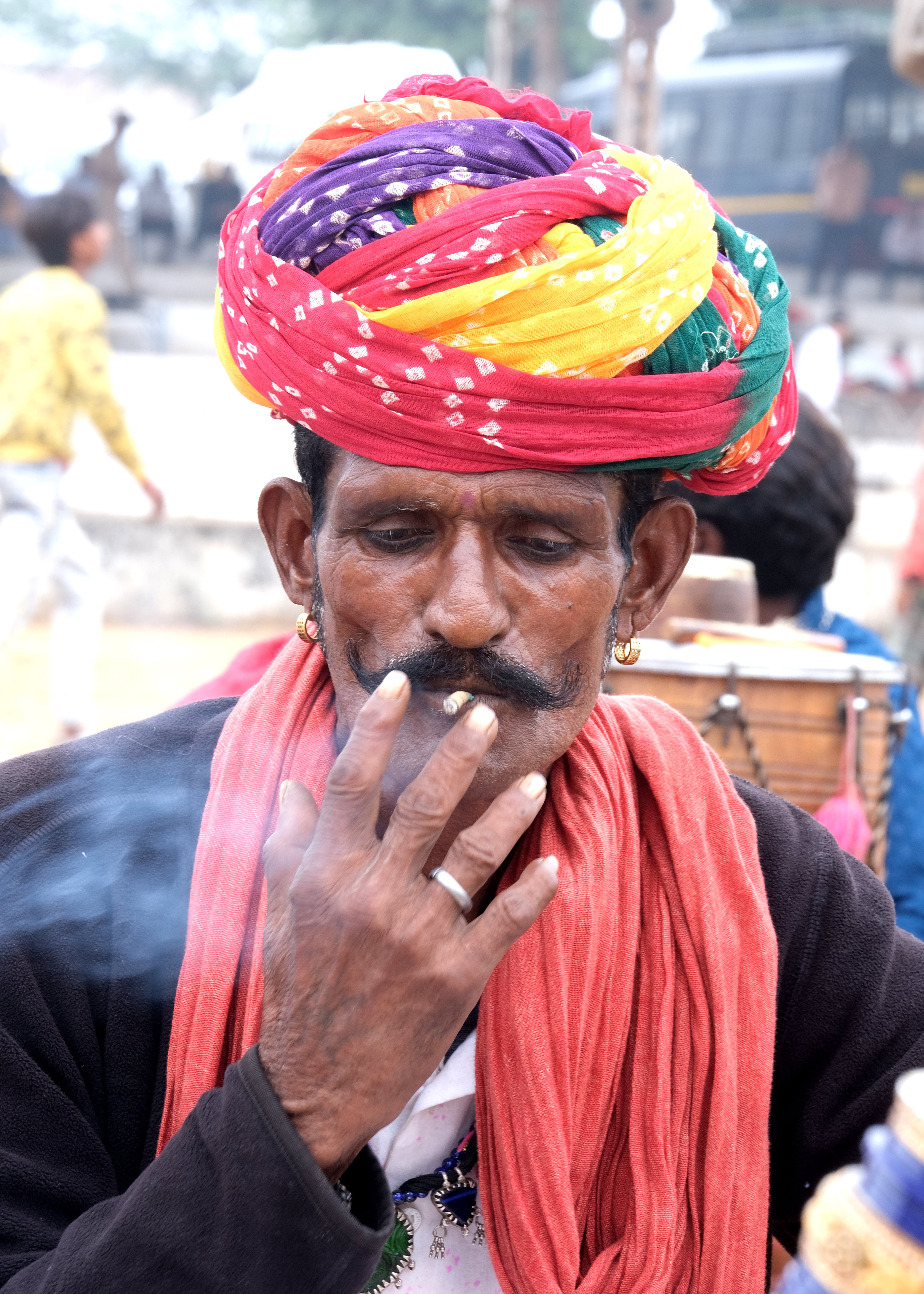 Beautiful color of turban and smoke the bidi
